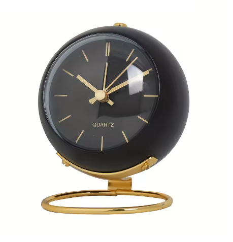 Stalo laikrodis su naktiniu apšvietimu