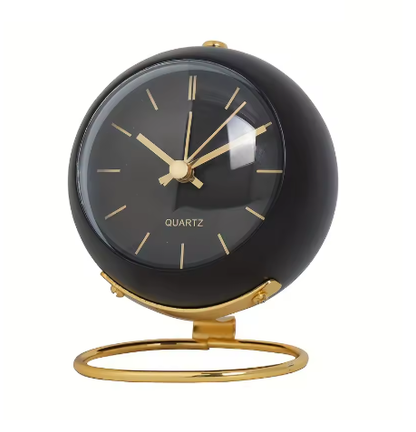 Stalo laikrodis su naktiniu apšvietimu