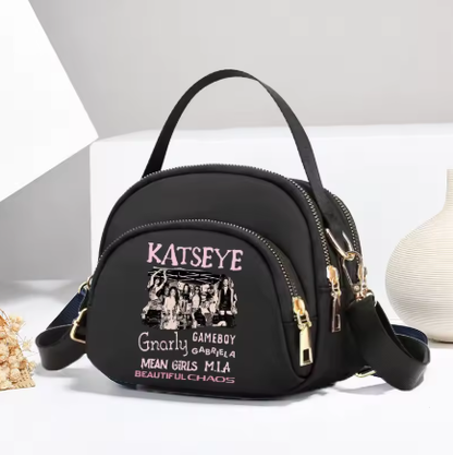 Katseye rankinė per petį